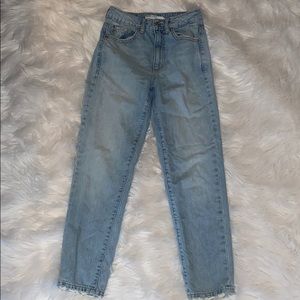 Garage mom jeans with butt rip